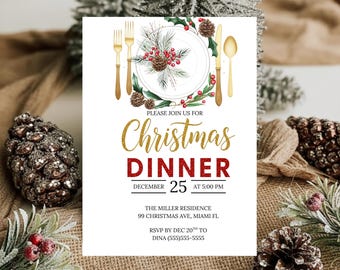 May include: A white invitation card with gold and red text for a Christmas Dinner. The card features a watercolor illustration of a plate with festive greenery and gold cutlery. The text reads "Christmas Dinner" and includes the date and time.