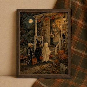 Pode incluir: Uma impressão emoldurada retratando uma cena de Halloween com três crianças fantasiadas nos degraus de uma varanda. Um adulto oferece doces. A cena inclui uma lua cheia, abóboras, um gato preto e uma placa escrita Trick or Treat.