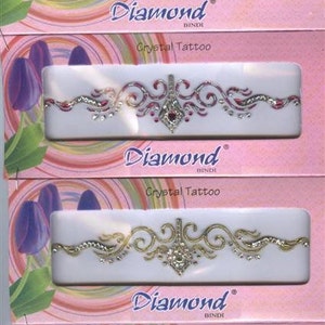 Brilliant Swarovski stones adorn this priceless tramp stamp decor face low back cleavage arm by Definitions