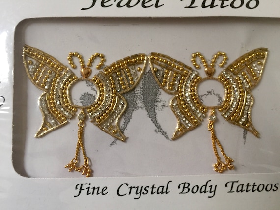 Crystal butterflies in gold ,silver 2 "long with 3" wingspan, so many swarovski stones adorn this pretty tattoo 2018,reusable ,self adhesive
