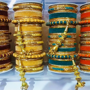 Royal Bridal Bangles princess dangles , best ever designed by Roger Rich and hand made in exotic colors size 2.6