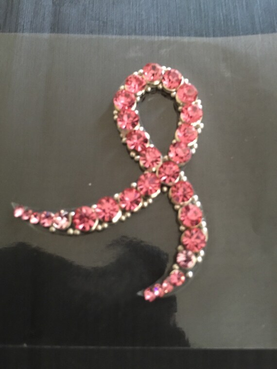 High quality ribbon made for customers to promote cancer awareness March , these are made by us using Swarovski stones