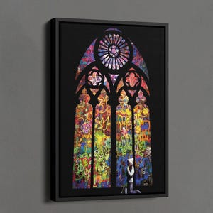 May include: A black framed canvas featuring a colorful stained-glass window design. The artwork showcases vibrant graffiti-style art in a variety of colors, with a figure kneeling in front of the window. The text "BLACK FRAMED CANVAS" is visible.