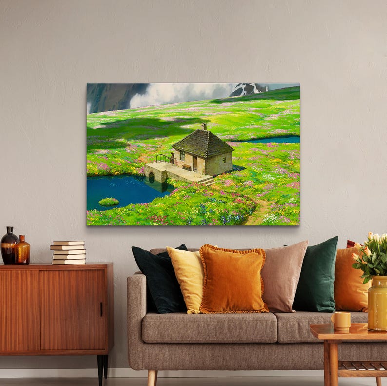 May include: A small, stone cottage with a brown roof sits on a green grassy hill with a small pond in front of it. The cottage has a wooden bridge leading to the front door. The hill is covered in wildflowers.