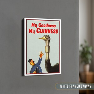 May include: A vintage poster with a white frame featuring a cartoon illustration of a man holding a bottle of Guinness beer and a large ostrich with the text "My Goodness My GUINNESS".