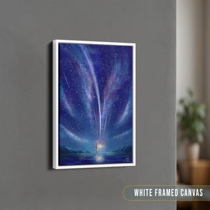 May include: A white framed canvas print featuring a blue night sky with a single figure standing in the foreground. The sky is filled with shooting stars and a milky way galaxy.