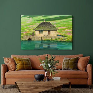 May include: A painting of a small, stone cottage with a thatched roof, situated on a grassy hill overlooking a still body of water. The cottage has a single window and a wooden door. The water reflects the sky and the surrounding landscape.