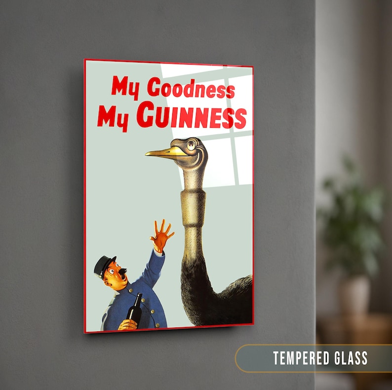 May include: A vintage advertisement for Guinness beer featuring a man looking up in surprise at a large ostrich with the text "My Goodness My GUINNESS" in red.