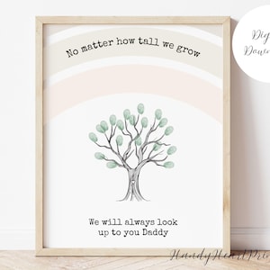 May include: A framed print with a tree illustration, featuring a heart on the trunk and green leaf-like fingerprints. The text reads "No matter how tall we grow" and "We will always look up to you Daddy."