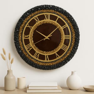 May include: A black and gold clock with Roman numerals and a brown face. The clock is surrounded by black and gold stones.