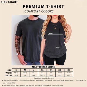 May include: A size chart for a premium Comfort Colors t-shirt. The graphic displays two individuals wearing dark gray t-shirts, with a diagram indicating width and length measurements. A table lists adult unisex sizing from S to 4X in inches.