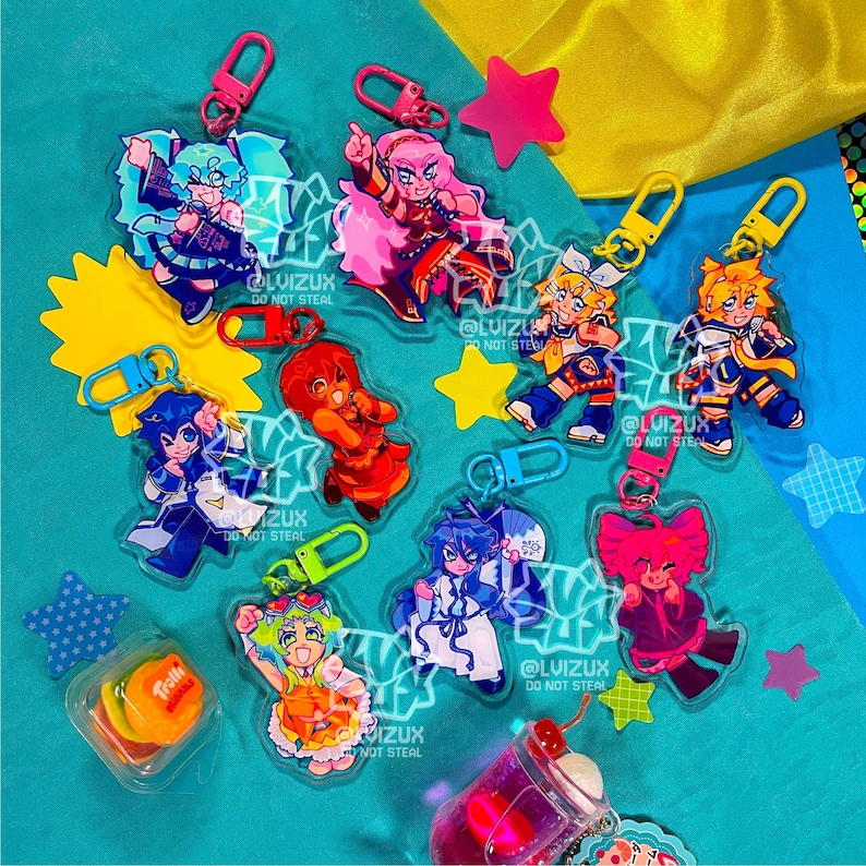 May include: A set of ten colorful anime character keychains with different designs. The keychains are made of clear acrylic and feature vibrant colors and intricate details. Each keychain has a metal ring for attaching to a bag or other items.