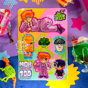 May include: A set of colourful stickers featuring characters from the anime Mob Psycho 100. The stickers are on a pink and yellow background with a grid pattern. The characters include Mob, Reigen, and Teruki. The stickers also include text that says "Mob Psycho 100" and "Have you seen him?"
