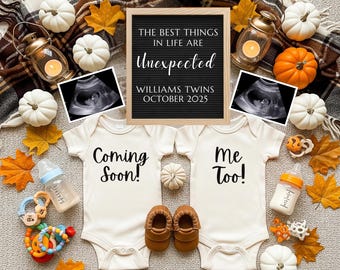 May include: An announcement with baby items. Two white onesies say "Coming Soon!" and "Me Too!" with baby shoes, bottles, and toys. A sign reads "The Best Things In Life Are Unexpected, Williams Twins, October 2025."