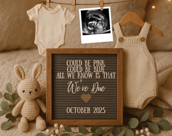 May include: A neutral-toned baby announcement setup. Includes a letter board with the text "COULD BE PINK, COULD BE BLUE, ALL WE KNOW IS THAT We're Due OCTOBER 2025", a sonogram, a onesie, and a knitted bunny.