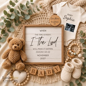 May include: A square wooden sign with the text WHEN THE TIME IS RIGHT, I THE LORD WILL MAKE IT HAPPEN. ISAIAH 60:22 NOVEMBER 2027. Includes a cream baby bodysuit with BABY Sophia, a sonogram, a brown teddy bear, wooden blocks spelling BABY, and booties.