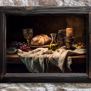 May include: A framed still life painting featuring a loaf of bread, grapes, a glass of wine, and a lit candle. A bottle of olive oil and a draped cloth are also visible. The painting has a dark, warm color palette.
