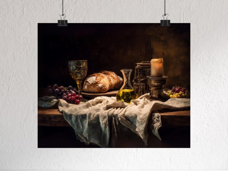 May include: A still life print featuring a rustic table setting. A loaf of bread, grapes, and a glass of wine are arranged on a linen cloth. A small bottle of olive oil and a lit candle add to the ambiance. The color palette is warm and inviting.