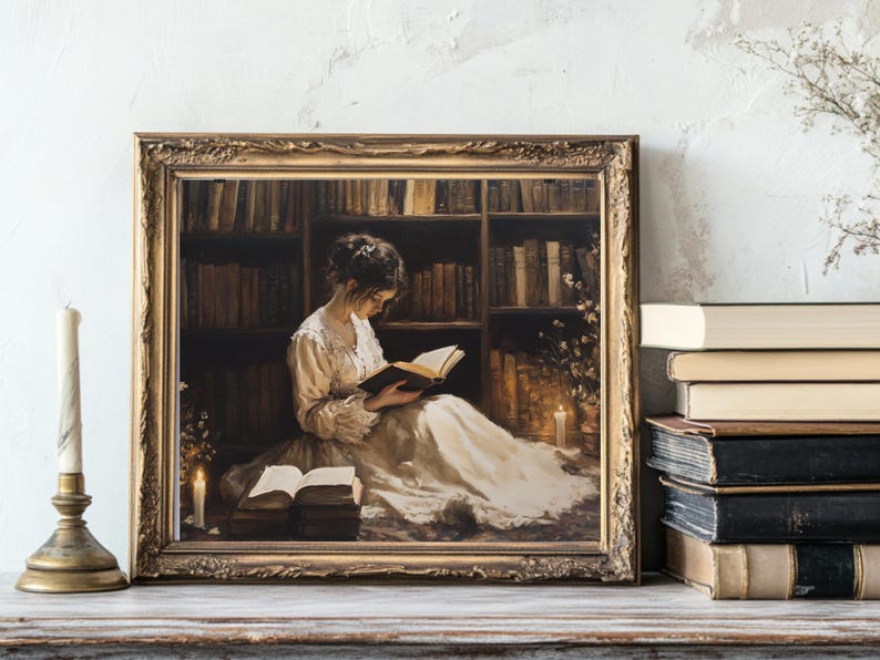 May include: A framed painting depicting a woman reading a book in a library setting. The woman is wearing a white dress and is seated in a chair. The library is filled with bookshelves and there are candles on the table.