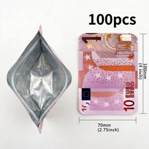 May include: A silver-lined, pink-edged pouch next to a rectangular card printed with a 10 Euro bill design. The card measures 100mm in height and 70mm in width. The text "100pcs" is displayed above the card.