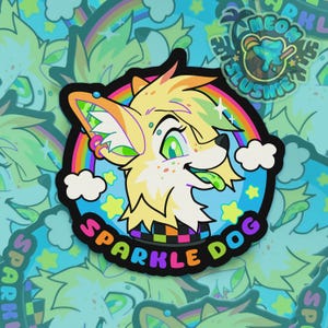 May include: A vibrant sticker showcasing a cartoon dog with yellow fur, green eyes, and a rainbow. The dog has its tongue out, surrounded by stars and the words "Sparkle Dog". Additional stickers are in the background.