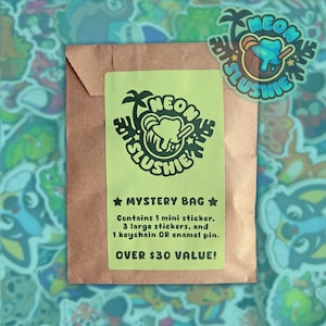 May include: A brown paper bag with a neon green label featuring the text "NEON SLUSHIE" and a tropical design. The label reads "MYSTERY BAG" and lists contents: 1 mini sticker, 3 large stickers, and 1 keychain or enamel pin.