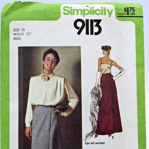 May include: Simplicity sewing pattern number 9113 for a skirt. The pattern is for a size 10 with a 25 inch waist. The pattern shows two different styles of skirts, one with a white top and the other with a red top. The pattern is labeled "Jiffy" and says "Tops not included".