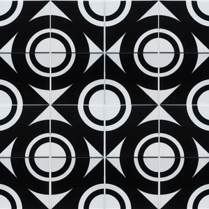 May include: A repeating pattern of black and white tiles. Each tile features a white circle within a black circle, with white arrow shapes at the corners. The design creates a bold, geometric aesthetic, suitable for flooring or wall decor.