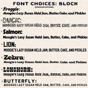May include: A graphic design image showing different font choices for the phrase "Moogies Lazy Susan Held Jam, Butter, Cake, and Pickles". The fonts are labeled "Froggie", "Duck", "Salmon", "Lion", "Zebra", "Longhorn", and "Butterfly".