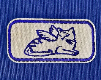 Toppa termoadesiva con gatto alato: stile vintage da favola