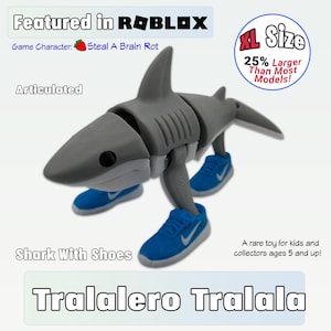 May include: A gray articulated shark toy wearing blue sneakers. The toy is XL size, 25% larger than most models, and is featured in Roblox. The game character is "Steal A Brain Rot". The toy is for kids and collectors ages 5 and up.
