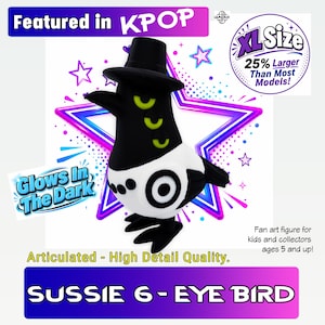 May include: A black and white articulated bird figure wearing a top hat, featuring three green eyes on its neck and a target symbol on its side. Text includes Featured in KPOP, XL Size 25% Larger Than Most Models, Glows In The Dark, and SUSSIE 6-EYE BIRD.