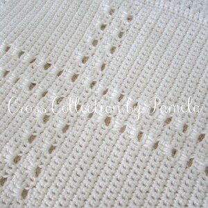 A crochet baby blanket pattern featuring a center cross design accented with a beautiful border. Easy crochet stitches. Pattern has been professionally edited. Finished size is about 28 by 32 inches. Perfect to crochet for a newborn or as a gift.