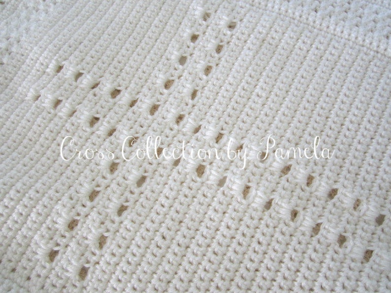 A crochet baby blanket pattern featuring a center cross design accented with a beautiful border. Easy crochet stitches. Pattern has been professionally edited. Finished size is about 28 by 32 inches. Perfect to crochet for a newborn or as a gift.