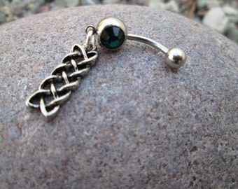 celtic design with a green stone belly button ring piercing