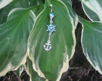 anchor and ships wheel surrounded by aqua rhinestones belly button ring piercing