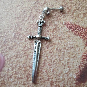 sword belly button ring., body jewelry piercing