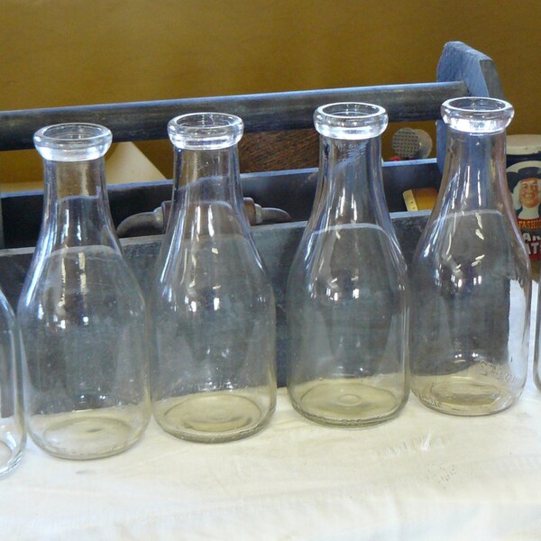 6 vintage one quart milk bottles