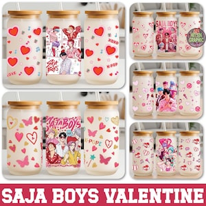 May include: Glass tumblers with bamboo lids, decorated with hearts, butterflies, musical notes, and the text "LOVE", "XOXO", and "K-POP". Some tumblers feature "SAJA BOYS" and "SAJA BOYS VALENTINE" graphics.