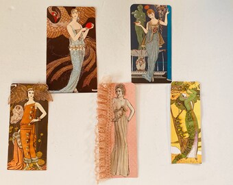 Five Embellished French Flapper Fashions Embellished with Rhinestones, Jewels, Feathers, Beading, and Old Jewelry, Adhered to Cardstock.