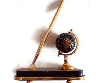 Vintage Pen Set with Rotating World Globe on a Deep Blue and Gold Stone Platform