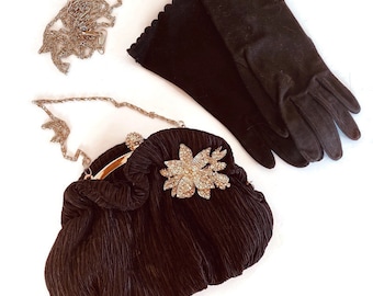 For sale is a vintage black set of gloves and a jeweled purse with adjustable handles.