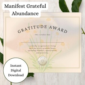 May include: A certificate with the words "Gratitude Award" in a serif font. The certificate has a floral design and the text "Manifest Grateful Abundance" at the top. The words "Instant Digital Download" are in a circle at the bottom.