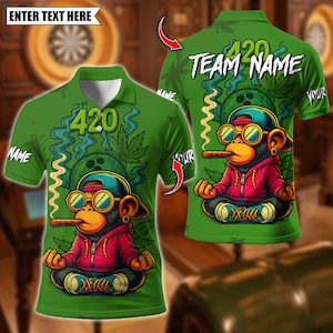 May include: Green polo shirt featuring a cartoon monkey wearing sunglasses, a red hoodie, and a cap, smoking a cigar. The shirt has the number "420" and cannabis leaf designs. The back of the shirt says "420 TEAM NAME".