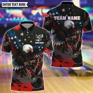 May include: Black polo shirt featuring a bald eagle design with red, white, and blue accents. The shirt includes bowling pins and bowling balls. The text "TEAM NAME" and "YOUR NAME" are displayed on the shirt. The words "ENTER TEXT HERE" are also displayed.