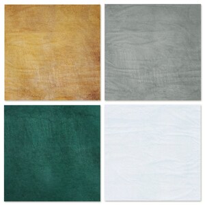 May include: Four square textured paper samples in different colors: light brown, gray, dark green, and white.