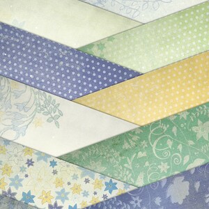 May include: A digital paper pack with a blue, green, yellow, and white color scheme. The papers feature various floral patterns and polka dots. The text "Blue Bell Digital Paper Carrie Stephens Art" is at the bottom of the image.
