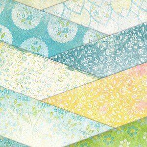 Op de afbeelding: Digitaal papierpakket met een landelijk zonneschijn thema. Het pakket bevat zes verschillende patronen met bloemmotieven in tinten blauw, groen, geel en wit.