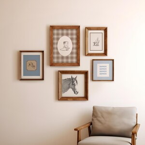 May include: A collection of framed art prints with a rustic, Western theme. The prints feature images of a horse, cowboy boots, a cactus, and the word "Howdy". The frames are made of wood.