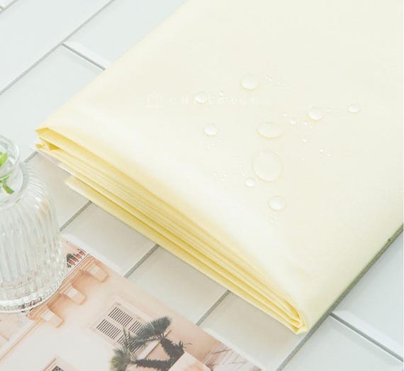 Waterproof Fabric | Cream Yellow Washed Cotton with Non-Toxic TPU Lamination, 150cm (59”) Wide, Made in Korea by the Yard (TPU-999691)